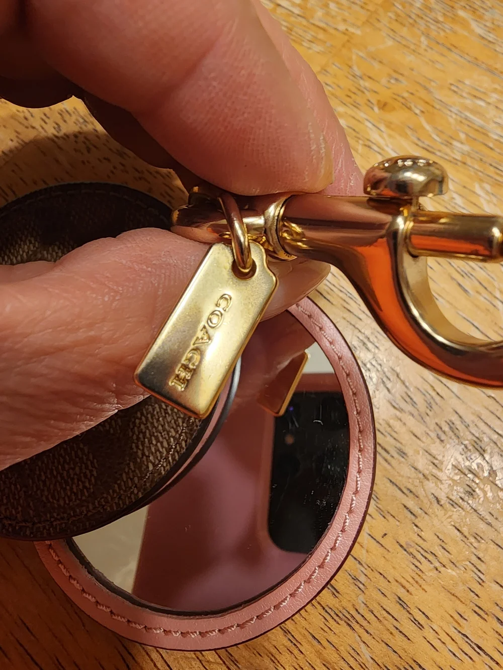 Coach Mirror Bag Charm in Signature Canvas the brand's iconic coated canvas